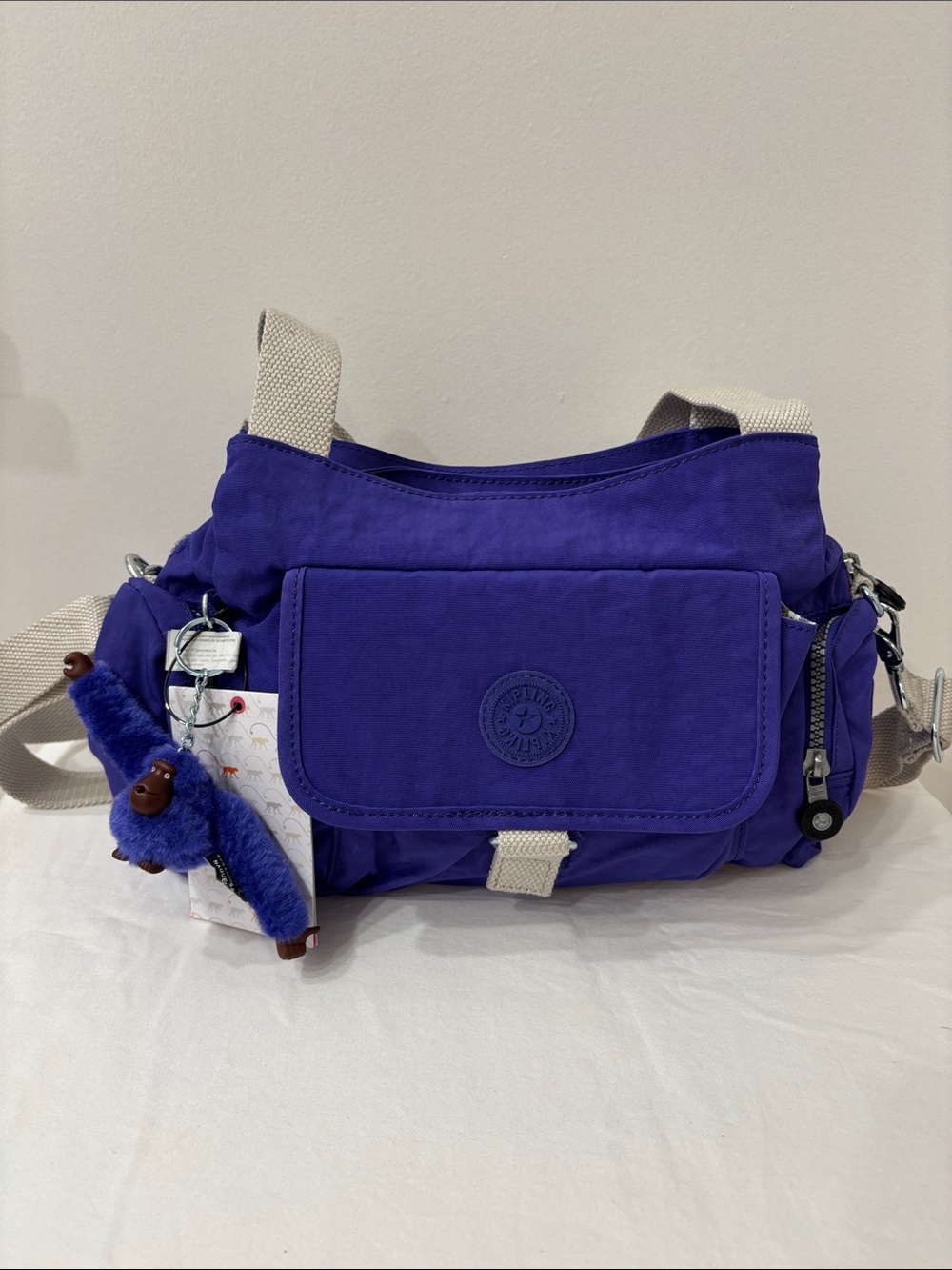 Kipling Icepop Purple Crossbody Bag with Cream Strap with Monkey Charm